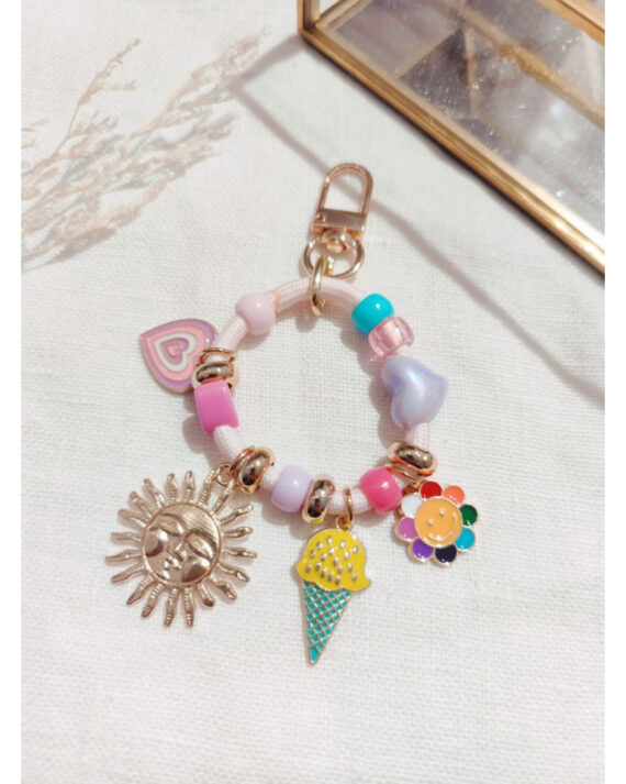 Mini gris-gris de sac soleil rose en laiton